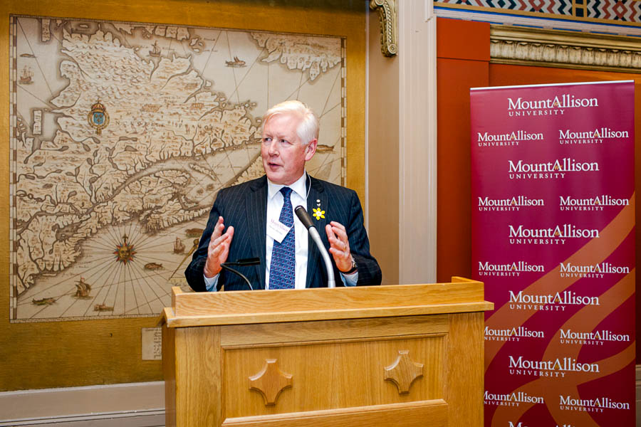 The honourable Bob Ray presents at an awards ceremony in Centre Block.