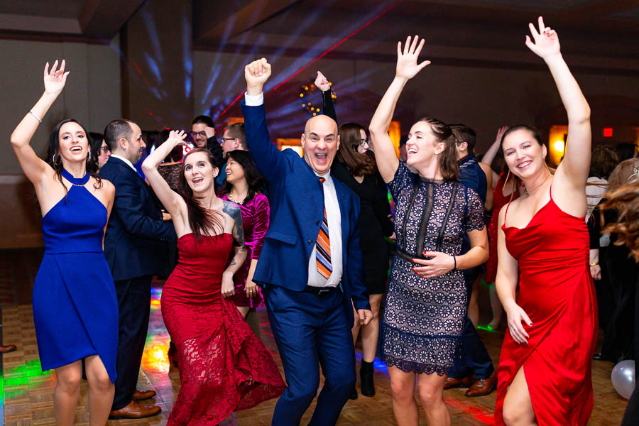 Costco employees dance and celebrate during their corporate holiday party at St. Elias Centre.