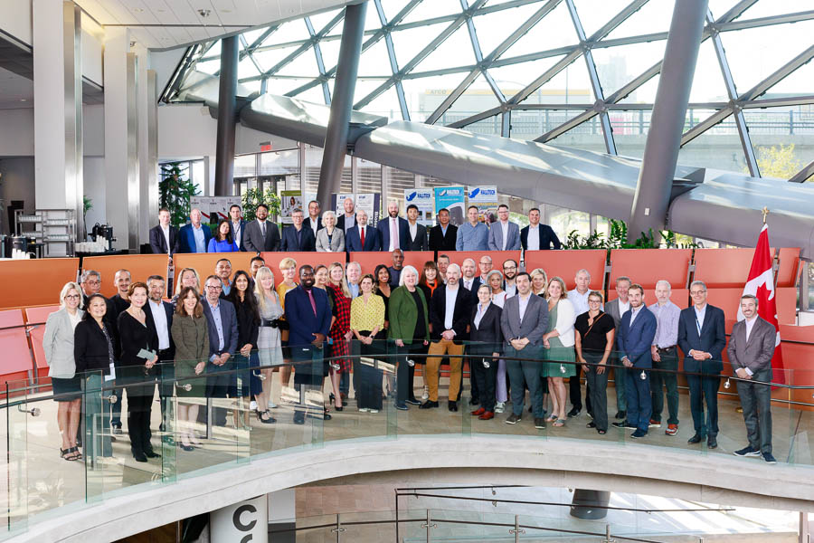 A large group photo of 56 executives taken at Rogers Centre Ottawa