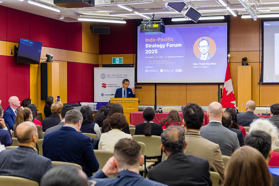 The honourable Yuen Pau Woo with the Senate of Canada presents at an Institute for Peace and Diplomacy conference at Rideau Committee Rooms.